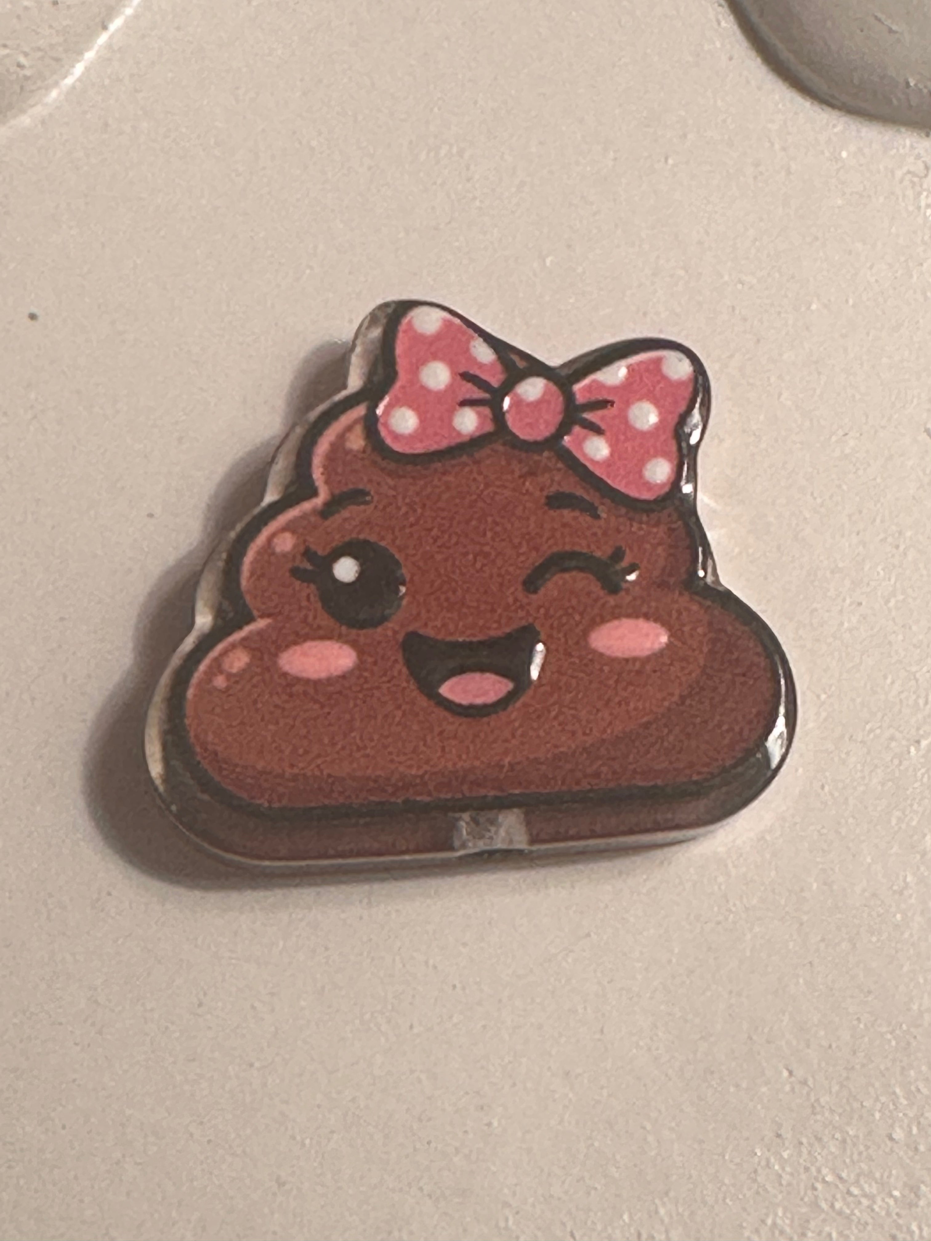 Acrylic smiley poo bead